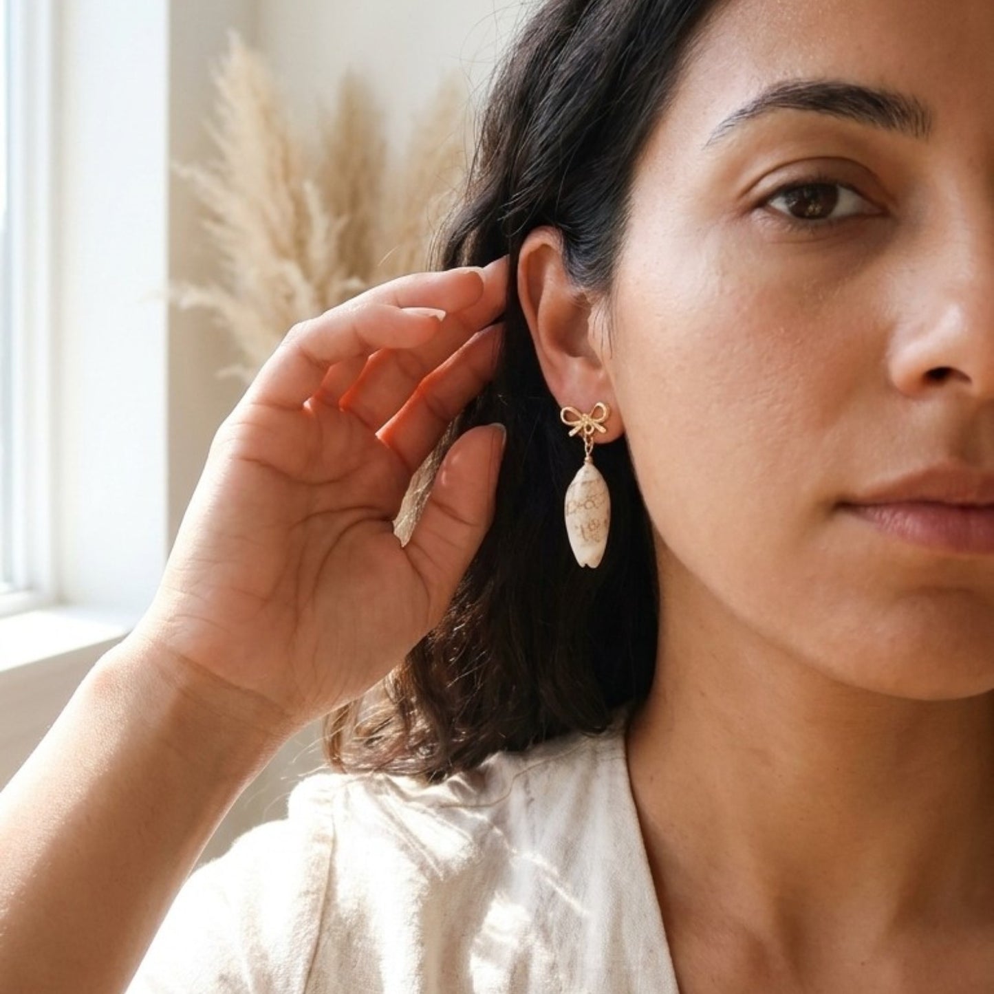 Coastal Cowrie Bow Earrings